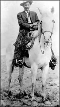 Will McCarter on his horse, White Eagle.